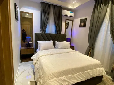 Bedroom with made bed