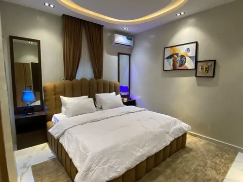 Bedroom with made bed