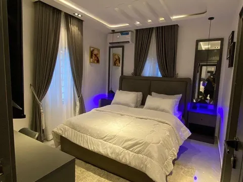Bedroom with made bed