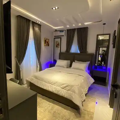 Bedroom with made bed